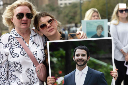 Clair Serrata, with mother Caroline (le��), holds a photo of her brother Stewart, who they believe died of an overdose. Jessica Phelps