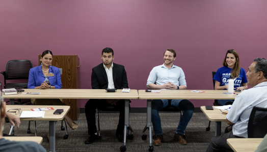 District 7 candidates Sandragrace Martinez, from left, Jacob Chapa, Dan Rossiter and Marina Alderete Gavito present their campaigns during a forum at Forest Hills Library on April 3. Credit: Bria Woods / San Antonio Report