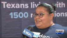 A video screengrab of Maggie talking into a KXAN microphone, including the KXAN logo