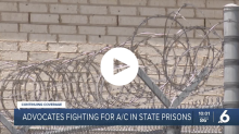Video screengrab of barbed wire, Text: advocates fighting for AC in state prisons, KRIS6 logo